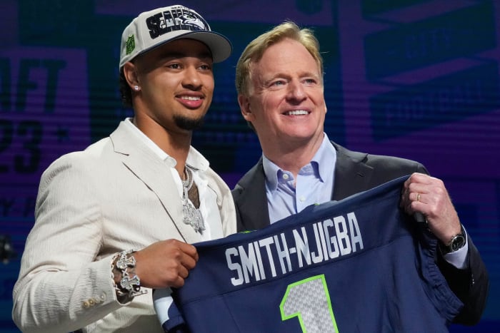 Seattle Seahawks first-round draft pick Jaxon Smith-Njigba with NFL commissioner Roger Goodell